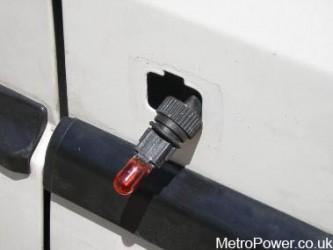 fitting orange bulbs to holder