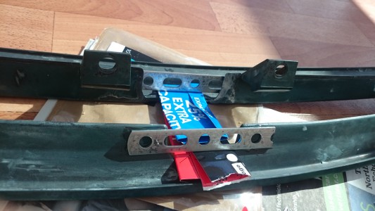 attaching metal strip to fill gap in debadged rover 100 front grille