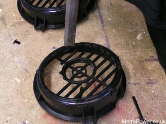removing speaker grille slats with a chisel