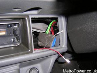 close up view of wiring hidden behind metro vent