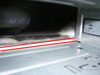 ensure no wires are caught on the highlighted red line when refitting the head unit